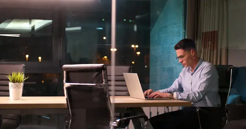 Professional working late on laptop