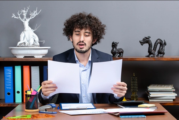 Business owner reviewing trademark documents